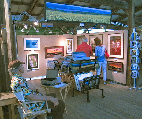 Jim at his booth in the Summer Artist Market, 2017