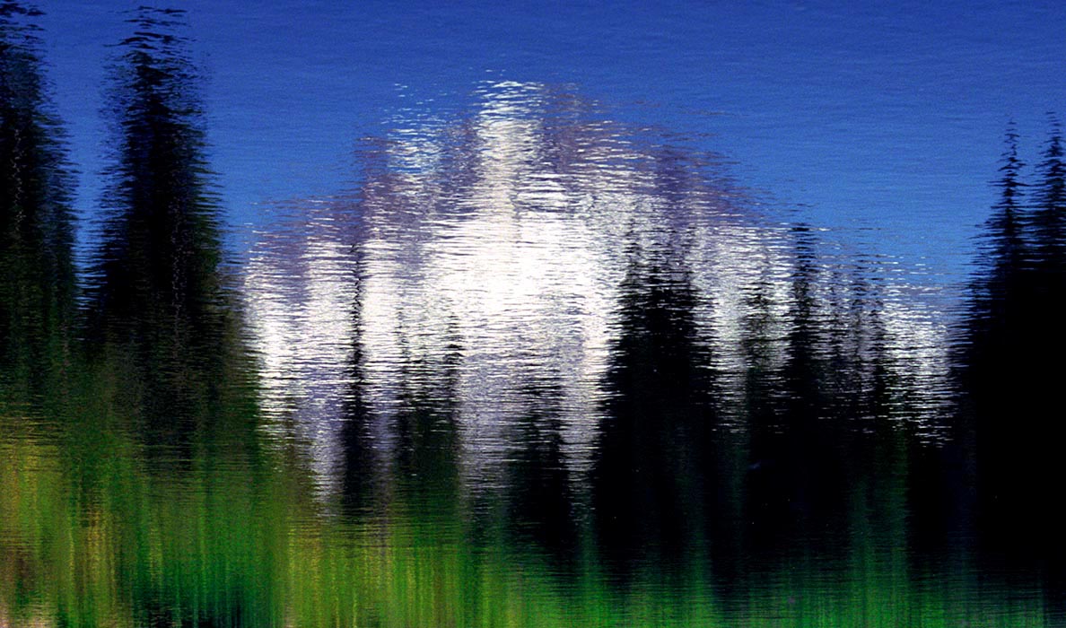 Inverted reflection of Mt. Hood in wind-rippled Mirror Lake